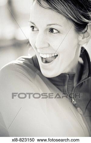 Young women laughing View Large Photo Image Stock Image - Young women laughing. Fotosearch