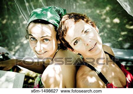 Stock Photo - Young women portrait. Fotosearch