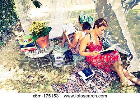 young women reading books View Large Photo Image Stock Image - young women reading books. Fotosearch