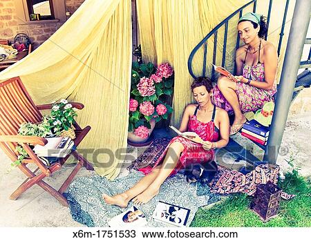 young women reading books View Large Photo Image Stock Image - young women reading books. Fotosearch