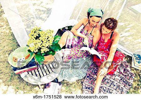 young women reading books View Large Photo Image Stock Photo - young women reading books. Fotosearch