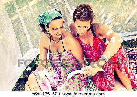 young women reading books View Large Photo Image Stock Photo - young women reading books. Fotosearch