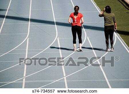 Young women training on tracks, Valencia. Comunidad Valenciana, Spain View Large Photo Image Stock Photo - Young women training on tracks, Valencia. Comunidad Valenciana, Spain. Fotosearch