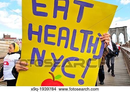 Youth, young adults, and adults of the Seventh-Day Adventist Church march across the Brooklyn Bridge during the annual Anti-Violence Compassiono rally on March 23, 2013, Manhattan, New York City, USA. View Large Photo Image Picture - Youth, young adults, and adults of the Seventh-Day Adventist Church march across the Brooklyn Bridge during the annual Anti-Violence Compassiono rally on March 23, 2013, Manhattan, New York City, USA.. Fotosearch