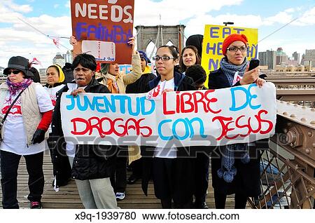 Youth, young adults, and adults of the Seventh-Day Adventist Church march across the Brooklyn Bridge during the annual Anti-Violence Compassiono rally on March 23, 2013, Manhattan, New York City, USA. View Large Photo Image Stock Image - Youth, young adults, and adults of the Seventh-Day Adventist Church march across the Brooklyn Bridge during the annual Anti-Violence Compassiono rally on March 23, 2013, Manhattan, New York City, USA.. Fotosearch
