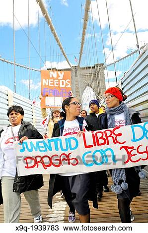 Youth, young adults, and adults of the Seventh-Day Adventist Church march across the Brooklyn Bridge during the annual Anti-Violence Compassiono rally on March 23, 2013, Manhattan, New York City, USA. View Large Photo Image Stock Image - Youth, young adults, and adults of the Seventh-Day Adventist Church march across the Brooklyn Bridge during the annual Anti-Violence Compassiono rally on March 23, 2013, Manhattan, New York City, USA.. Fotosearch