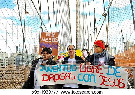Youth, young adults, and adults of the Seventh-Day Adventist Church march across the Brooklyn Bridge during the annual Anti-Violence Compassiono rally on March 23, 2013, Manhattan, New York City, USA. View Large Photo Image Stock Photo - Youth, young adults, and adults of the Seventh-Day Adventist Church march across the Brooklyn Bridge during the annual Anti-Violence Compassiono rally on March 23, 2013, Manhattan, New York City, USA.. Fotosearch