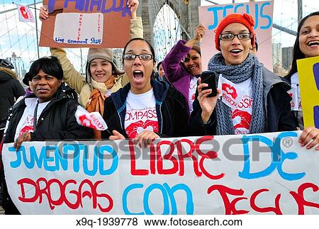 Stock Photo - Youth, young adults, and adults of the Seventh-Day Adventist Church march across the Brooklyn Bridge during the annual Anti-Violence Compassiono rally on March 23, 2013, Manhattan, New York City, USA.. Fotosearch