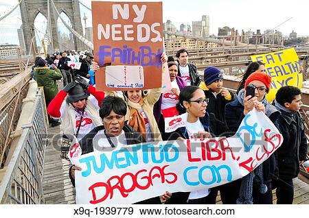 Youth, young adults, and adults of the Seventh-Day Adventist Church march across the Brooklyn Bridge during the annual Anti-Violence Compassiono rally on March 23, 2013, Manhattan, New York City, USA. View Large Photo Image Stock Photo - Youth, young adults, and adults of the Seventh-Day Adventist Church march across the Brooklyn Bridge during the annual Anti-Violence Compassiono rally on March 23, 2013, Manhattan, New York City, USA.. Fotosearch