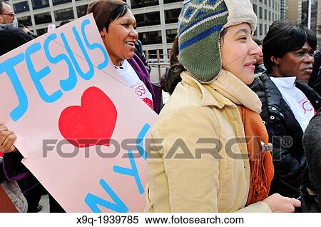 Youth, young adults, and adults of the Seventh-Day Adventist Church march across the Brooklyn Bridge during the annual Anti-Violence Compassiono rally on March 23, 2013, Manhattan, New York City, USA. View Large Photo Image Stock Photography - Youth, young adults, and adults of the Seventh-Day Adventist Church march across the Brooklyn Bridge during the annual Anti-Violence Compassiono rally on March 23, 2013, Manhattan, New York City, USA.. Fotosearch