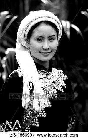 Yunnan woman in traditional costume in Kumming China View Large Photo Image Stock Photo - Yunnan woman in traditional costume in Kumming China. Fotosearch