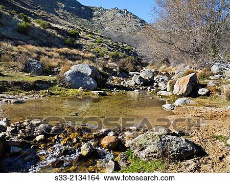 Zapatero stream in the Sierra de la Paramera. Navandrinal. Avila. Castilla Leon. Spain. View Large Photo Image Picture - Zapatero stream in the Sierra de la Paramera. Navandrinal. Avila. Castilla Leon. Spain.. Fotosearch