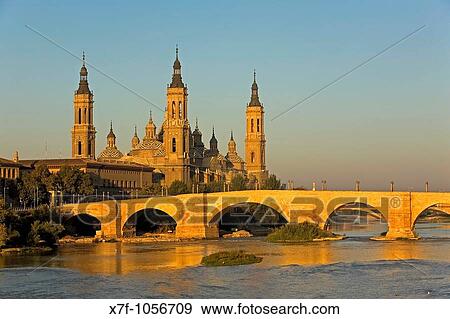 Zaragoza, Arag? n, Spain: Basilica of Nuestra Seora del Pilar and Puente de Piedra, bridge over Ebro river View Large Photo Image Stock Photo - Zaragoza, Arag? n, Spain: Basilica of Nuestra Seora del Pilar and Puente de Piedra, bridge over Ebro river. Fotosearch