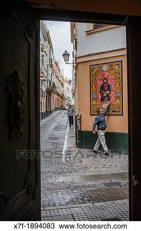 Zaragoza street at Benjumeda street Picture of Jesus Christ on elaborate ceramics CBdiz, Andalusia, Spain View Large Photo Image Stock Image - Zaragoza street at Benjumeda street Picture of Jesus Christ on elaborate ceramics CBdiz, Andalusia, Spain. Fotosearch