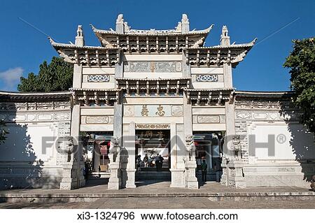 Stock Photograph - Zhong Yi Gate in the Dayan old town, Lijiang, Yunnan Province, China. Fotosearch