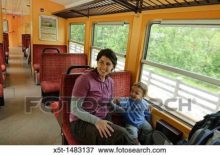 Zillertal, Tyrol, Austria, Steam hauled tourist train on the narrow gauge Zillertalbahn Car interior View Large Photo Image Stock Photo - Zillertal, Tyrol, Austria, Steam hauled tourist train on the narrow gauge Zillertalbahn Car interior. Fotosearch