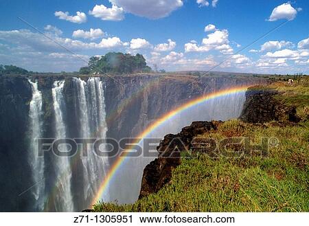 Zimbabwe, Victoria Falls, Zambezi River, rainbow, View Large Photo Image Stock Image - Zimbabwe, Victoria Falls, Zambezi River, rainbow,. Fotosearch