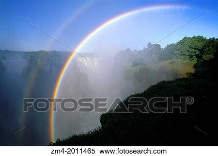 ZIMBABWE, VICTORIA FALLS, ZAMBEZI RIVER, RAINBOW. View Large Photo Image Stock Photography - ZIMBABWE, VICTORIA FALLS, ZAMBEZI RIVER, RAINBOW.. Fotosearch