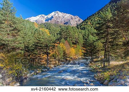 Zinqueta river. Posets y Maladeta Nature park in Autumn, Gista? n Valley, Sobrarbe, Huesca, Arag? n, Spain. View Large Photo Image Stock Image - Zinqueta river. Posets y Maladeta Nature park in Autumn, Gista? n Valley, Sobrarbe, Huesca, Arag? n, Spain.. Fotosearch