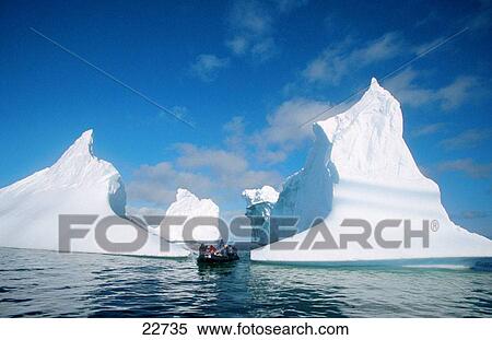 Zodiac with tourists. Antarctic peninsula View Large Photo Image Stock Photography - Zodiac with tourists. Antarctic peninsula. Fotosearch