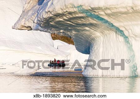 Zodiacs from the Lindblad Expeditions ship National Geographic Explorer amongst grounded icebergs near Rode O Red Island, Scoresbysund, Northeast Greenland View Large Photo Image Stock Image - Zodiacs from the Lindblad Expeditions ship National Geographic Explorer amongst grounded icebergs near Rode O Red Island, Scoresbysund, Northeast Greenland. Fotosearch