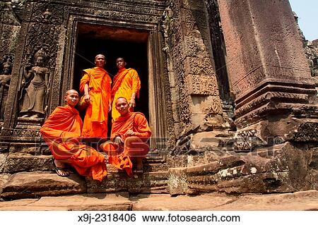 Buddhist monks at Bayon temple, Angkor thom, UNESCO World Heritage Site, Siem Reap, cambodia View Large Photo Image Stock Photograph - Buddhist monks at Bayon temple, Angkor thom, UNESCO World Heritage Site, Siem Reap, cambodia. Fotosearch