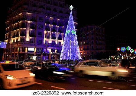 Christmas tree, funded by movistar, brand mobile operator Telefonica Moviles, specializing in mobile telecommunications, Noel, in the main street - Gran Via - in the capital of Madrid. Madrid, SPAIN - 14/12/2014. View Large Photo Image Stock Image - Christmas tree, funded by movistar, brand mobile operator Telefonica Moviles, specializing in mobile telecommunications, Noel, in the main street - Gran Via - in the capital of Madrid. Madrid, SPAIN - 14/12/2014.. Fotosearch