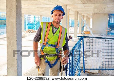 Stock Image - Construction Worker. Homebuilding. Donostia, San Sebastian, Basque Country, Spain.. Fotosearch