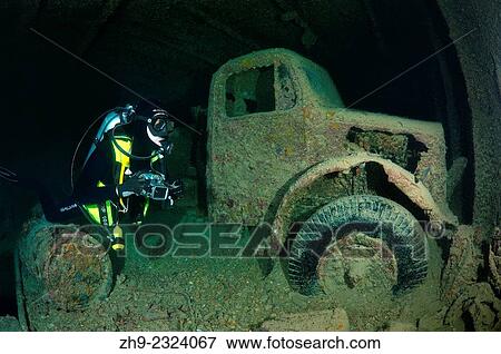 Diver looking at truck on shipwreck SS Thistlegorm (British armed Merchant Navy ship), Red Sea, Egypt. View Large Photo Image Stock Photo - Diver looking at truck on shipwreck SS Thistlegorm (British armed Merchant Navy ship), Red Sea, Egypt.. Fotosearch