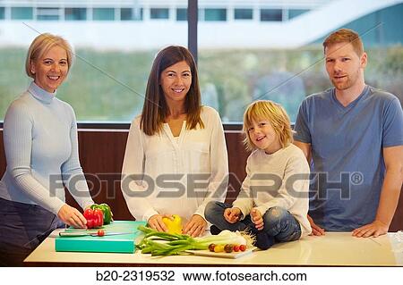 Family in the kitchen. Three generations. Healthy eating. Healthy growth. Vegetables. View Large Photo Image Stock Image - Family in the kitchen. Three generations. Healthy eating. Healthy growth. Vegetables.. Fotosearch