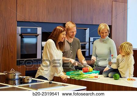 Family in the kitchen. Three generations. Healthy eating. Healthy growth. Vegetables. View Large Photo Image Stock Image - Family in the kitchen. Three generations. Healthy eating. Healthy growth. Vegetables.. Fotosearch