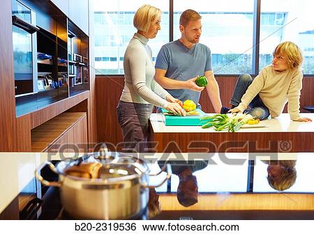 Family in the kitchen. Three generations. Healthy eating. Healthy growth. Vegetables. View Large Photo Image Stock Photograph - Family in the kitchen. Three generations. Healthy eating. Healthy growth. Vegetables.. Fotosearch