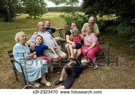 Four generations of Polish and American families enjoying a happy moment during a business meeting. Zawady Central Poland. View Large Photo Image Stock Image - Four generations of Polish and American families enjoying a happy moment during a business meeting. Zawady Central Poland.. Fotosearch