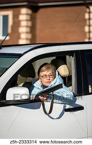 Picture - Hunting rifle, a means of self-defense.. Fotosearch