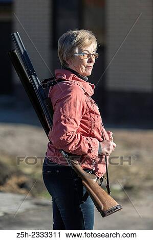 Stock Image - Hunting rifle, a means of self-defense.. Fotosearch