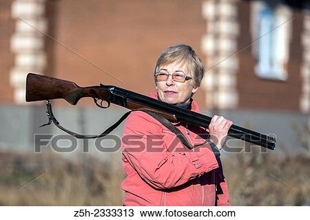 Stock Image - Hunting rifle, a means of self-defense.. Fotosearch