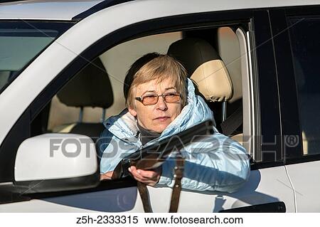 Stock Photography - Hunting rifle, a means of self-defense.. Fotosearch