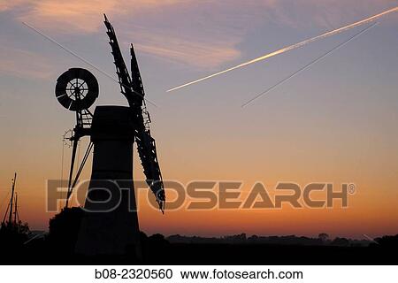Leisure boats and the windmill, Thurne, Norfolk Broads, Britain. View Large Photo Image Stock Image - Leisure boats and the windmill, Thurne, Norfolk Broads, Britain.. Fotosearch