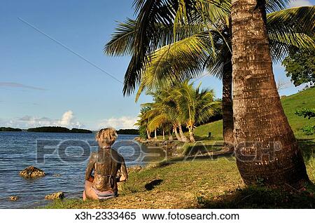 Stock Photography - mud bath at Babin beach, Morne-a-l'eau, Grande-Terre, Guadeloupe, overseas region of France, Leewards Islands, Lesser Antilles, Caribbean.. Fotosearch