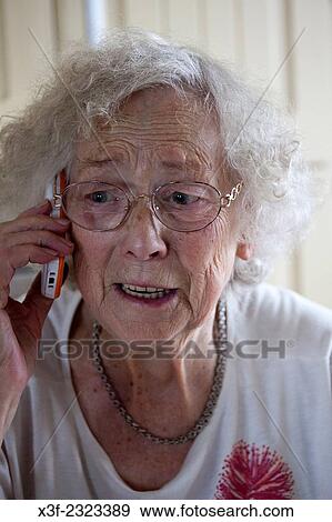 Polish great grandmother age 88 conversing on her cell phone. Zawady Central Poland. View Large Photo Image Stock Photo - Polish great grandmother age 88 conversing on her cell phone. Zawady Central Poland.. Fotosearch