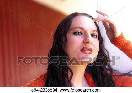 Portrait of a 33 year old brunette woman outdoors. View Large Photo Image Picture - Portrait of a 33 year old brunette woman outdoors.. Fotosearch