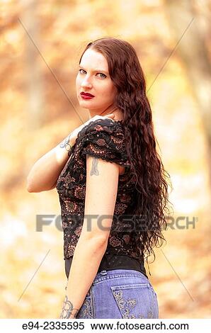 Portrait of a 33 year old brunette woman outdoors. View Large Photo Image Stock Photography - Portrait of a 33 year old brunette woman outdoors.. Fotosearch