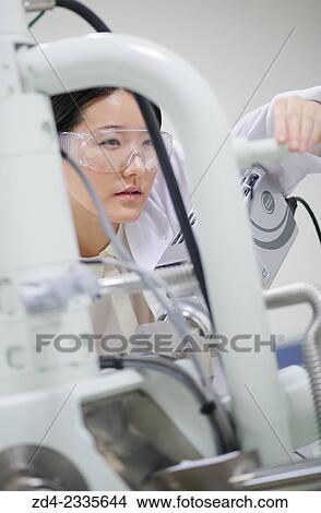 Researcher. SEM. Scanning Electronic Microscope. Technological Services to Industry. Tecnalia Research & Innovation, Donostia, San Sebastian, Gipuzkoa, Basque Country, Spain. View Large Photo Image Picture - Researcher. SEM. Scanning Electronic Microscope. Technological Services to Industry. Tecnalia Research & Innovation, Donostia, San Sebastian, Gipuzkoa, Basque Country, Spain.. Fotosearch