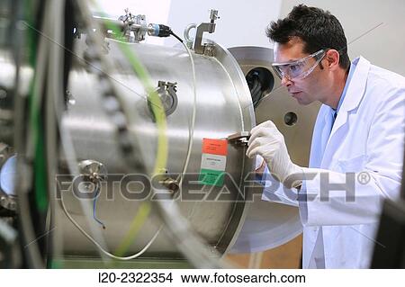 Researcher. Vacuum chamber for tribological measurements. Laboratory surfaces. Tecnalia Research and Innovation. Donostia. San Sebastian. Gipuzkoa. Basque Country. Spain. Europe. View Large Photo Image Picture - Researcher. Vacuum chamber for tribological measurements. Laboratory surfaces. Tecnalia Research and Innovation. Donostia. San Sebastian. Gipuzkoa. Basque Country. Spain. Europe.. Fotosearch