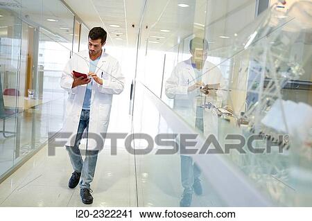 Researcher walking in hallway laboratory. Chemical Analysis Laboratory. Technological Services to Industry. Tecnalia Research & Innovation, Donostia, San Sebastian, Gipuzkoa, Basque Country, Spain. View Large Photo Image Stock Image - Researcher walking in hallway laboratory. Chemical Analysis Laboratory. Technological Services to Industry. Tecnalia Research & Innovation, Donostia, San Sebastian, Gipuzkoa, Basque Country, Spain.. Fotosearch