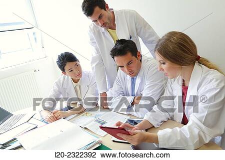 Stock Image - Researchers in meeting room. Technological Services to Industry. Tecnalia Research & Innovation, Donostia, San Sebastian, Gipuzkoa, Basque Country, Spain.. Fotosearch