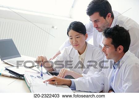 Stock Image - Researchers in meeting room. Technological Services to Industry. Tecnalia Research & Innovation, Donostia, San Sebastian, Gipuzkoa, Basque Country, Spain.. Fotosearch