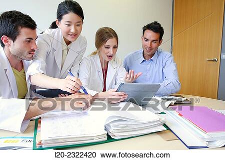 Stock Image - Researchers in meeting room. Technological Services to Industry. Tecnalia Research & Innovation, Donostia, San Sebastian, Gipuzkoa, Basque Country, Spain.. Fotosearch