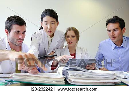 Stock Image - Researchers in meeting room. Technological Services to Industry. Tecnalia Research & Innovation, Donostia, San Sebastian, Gipuzkoa, Basque Country, Spain.. Fotosearch
