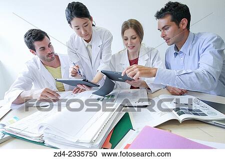 Stock Image - Researchers in meeting room. Technological Services to Industry. Tecnalia Research & Innovation, Donostia, San Sebastian, Gipuzkoa, Basque Country, Spain.. Fotosearch